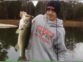 -Well i caught the fish ant lake Clack in walton County Georgia. -I was using a chartreuse 3/8oz. double willow leaf gold blade spinner bait   -We weighed the fish it weighed 14lb 2oz it was 28
