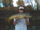 I caught this carp in a small creek by my house in Abilene, Texas. Lucky for me I was wearing my Bill Dance hat.
