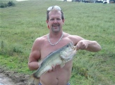 This is my biggest bass so far. It weighed 6 pounds. I caught it at a farm pond in Hardin County, Ky. August. It was mid afternoon and around 95 degrees.