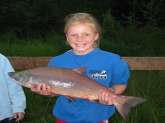 My middle daughter with her first Alaska red salmon.