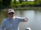 My wife Teressa's 2nd Bass ever. Caught at Wheeler lake AL. 23 April 2010. You can't buy a smile like that, you have to go out and catch it. Thanks Mr. dance