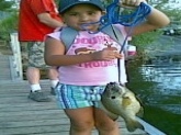 this is clarissa munguia redear sunfish 2.5lbs 11 3/4s long on 4lb test line caught wit a nightcrawer at patagonia,lake in tucson arz...she is 6yrs old...& didnt need no help from dad...game & fish knws...as well as coming on the t.v news & the news paper...we r big big fans keep up the gr8 shows we love u...